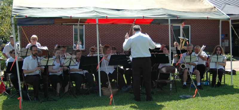 The band playing under a tent